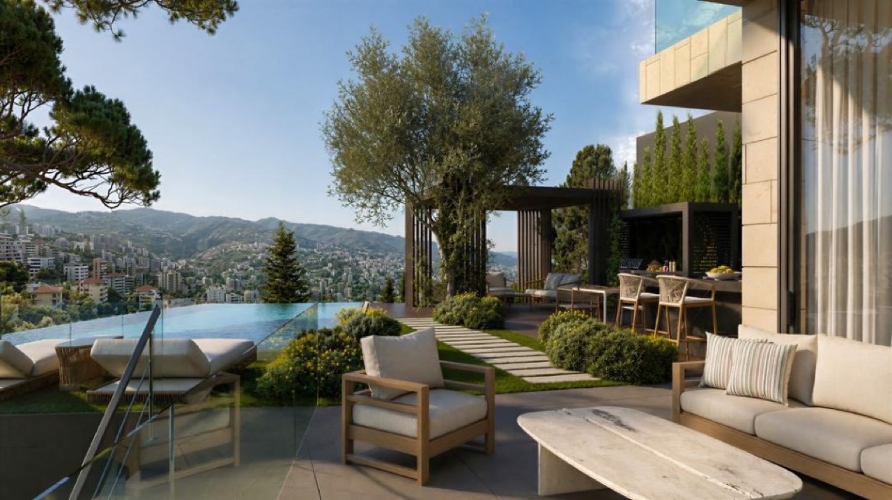Rooftop terrace lounge overlooking mountain cityscape
